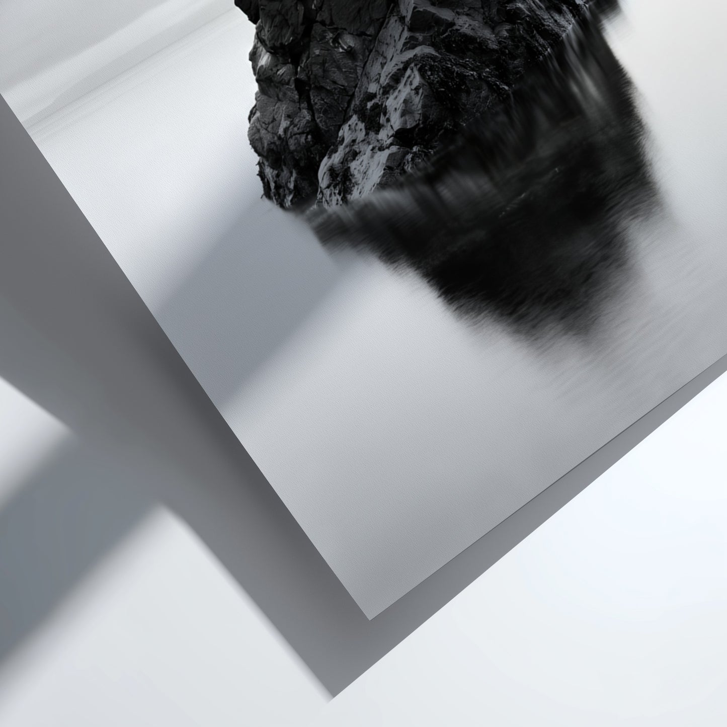 minimalist wall decor of rock formation in still water black and white photography