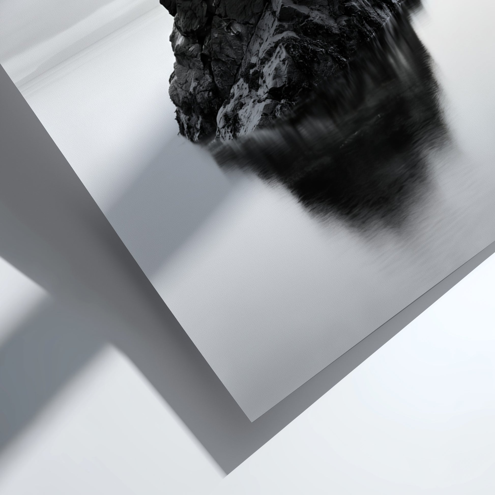 minimalist wall decor of rock formation in still water black and white photography
