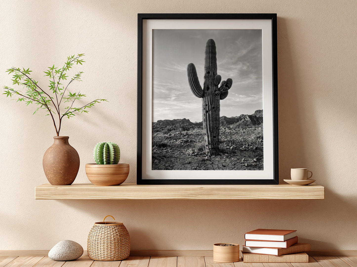 Poster of a monochrome saguaro cactus in desert with rocky ground and cloudy sky