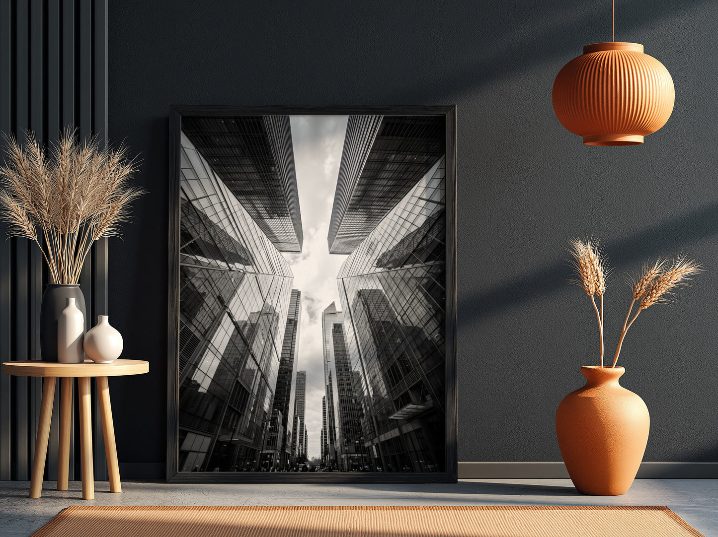 Wall decor featuring black-and-white urban photography of skyscrapers converging with reflective glass