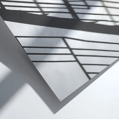 Poster featuring black spiral staircase shadows on white wall in minimalist modern style
