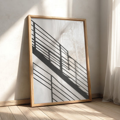 Poster featuring black spiral staircase shadows on white wall in minimalist modern style