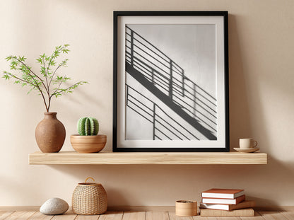 Poster featuring black spiral staircase shadows on white wall in minimalist modern style