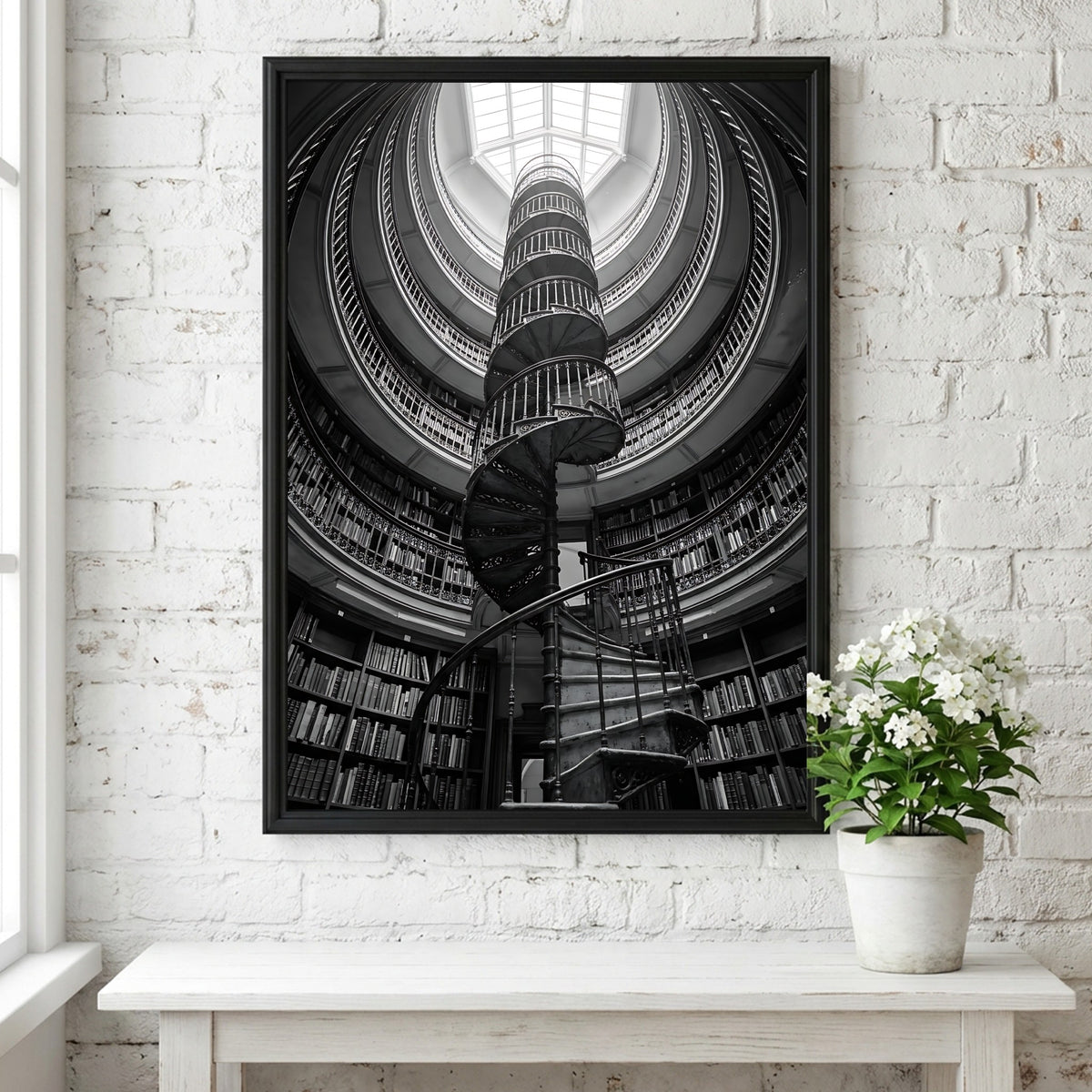 black and white poster featuring spiral staircase inside circular library with iron railings and skylight
