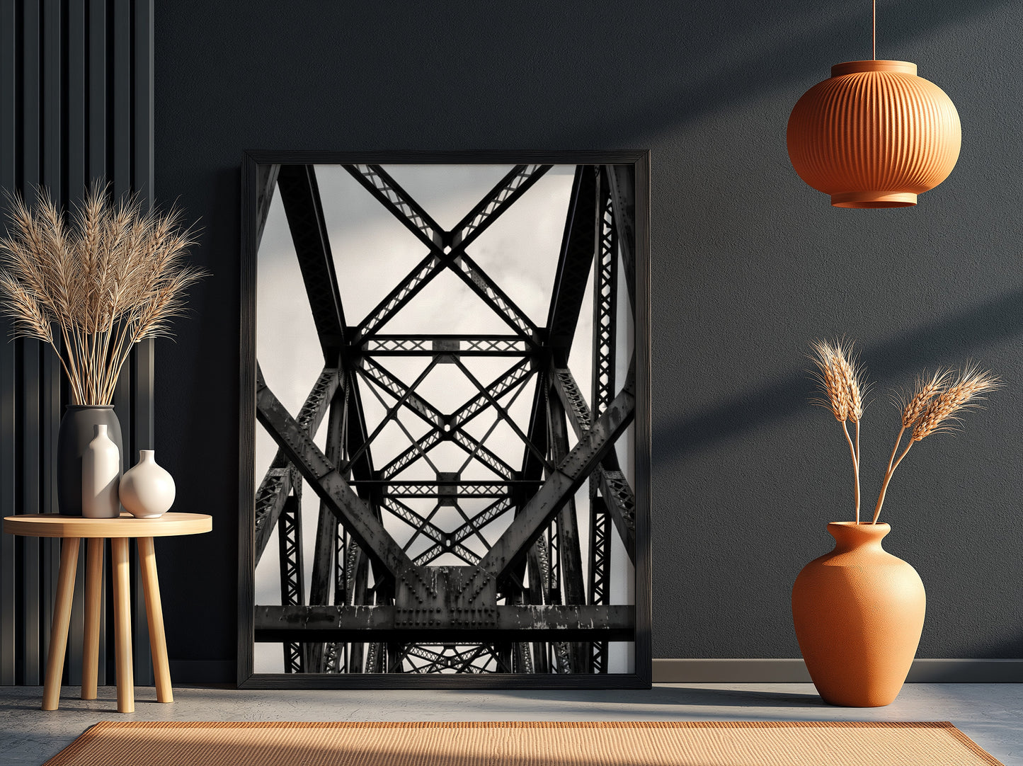 Black and white wall decor featuring steel bridge trusses with geometric patterns and strong shadows