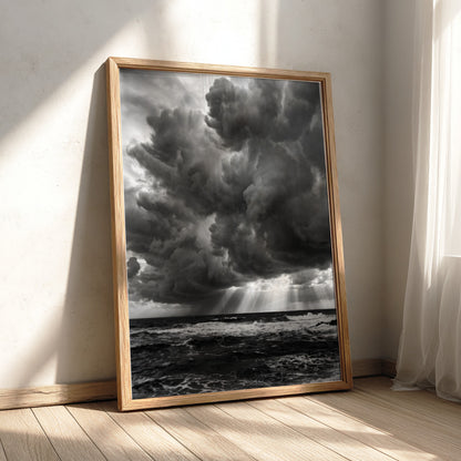 moody wall decor showing storm clouds over dark turbulent water in black and white photograph
