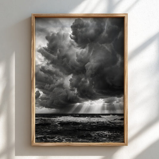 moody wall decor showing storm clouds over dark turbulent water in black and white photograph