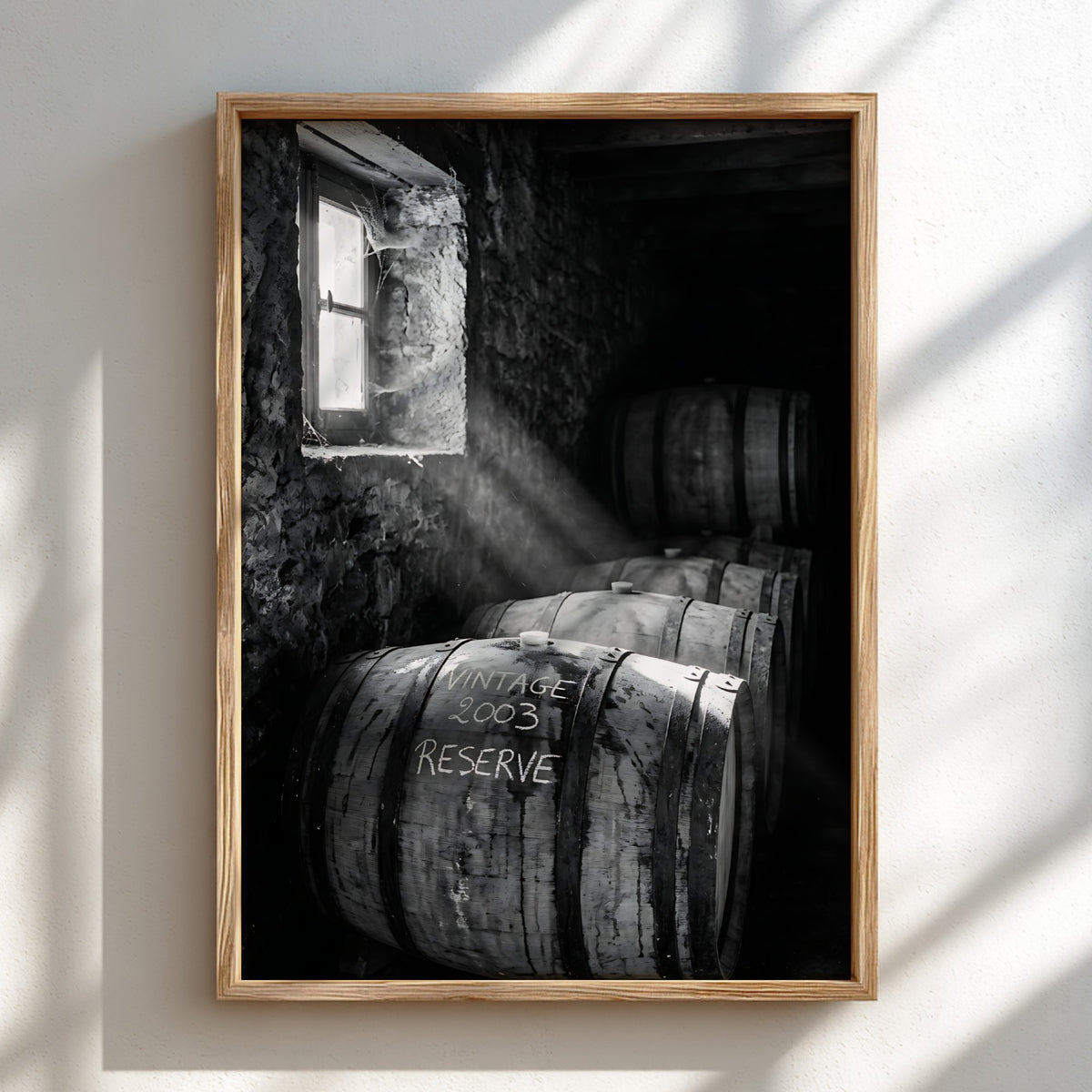 Poster of stacked whiskey barrels in rustic cellar with sunlight illuminating barrels and walls