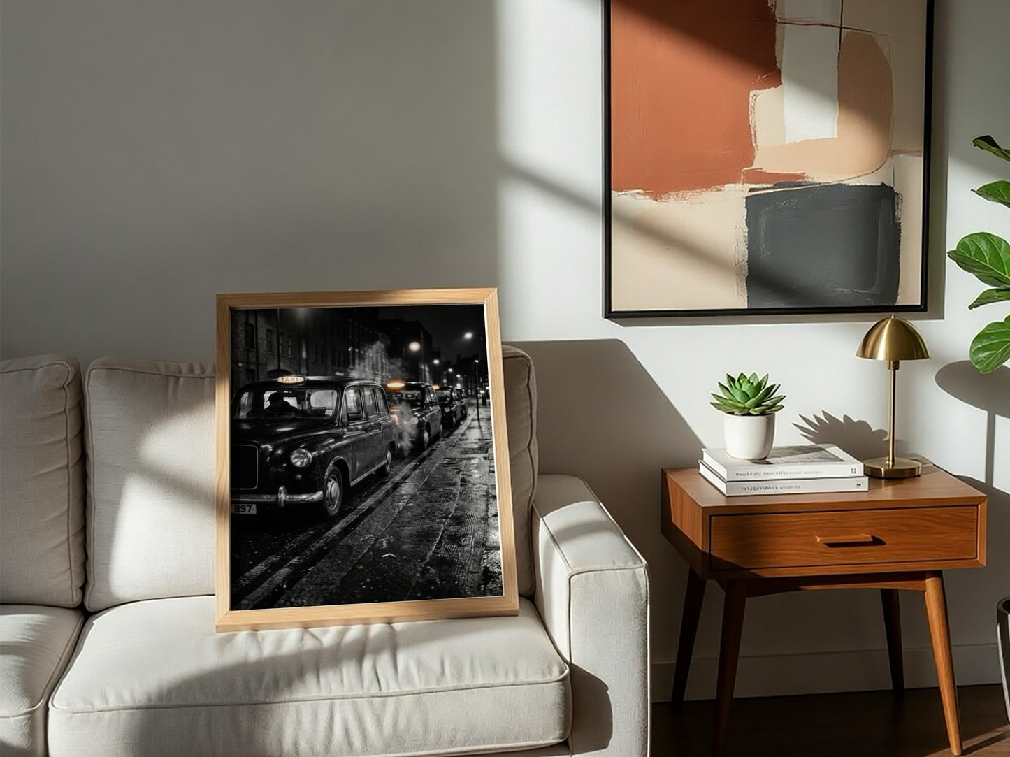Wall decor showing black and white photo of London black cabs lined up at night on wet street