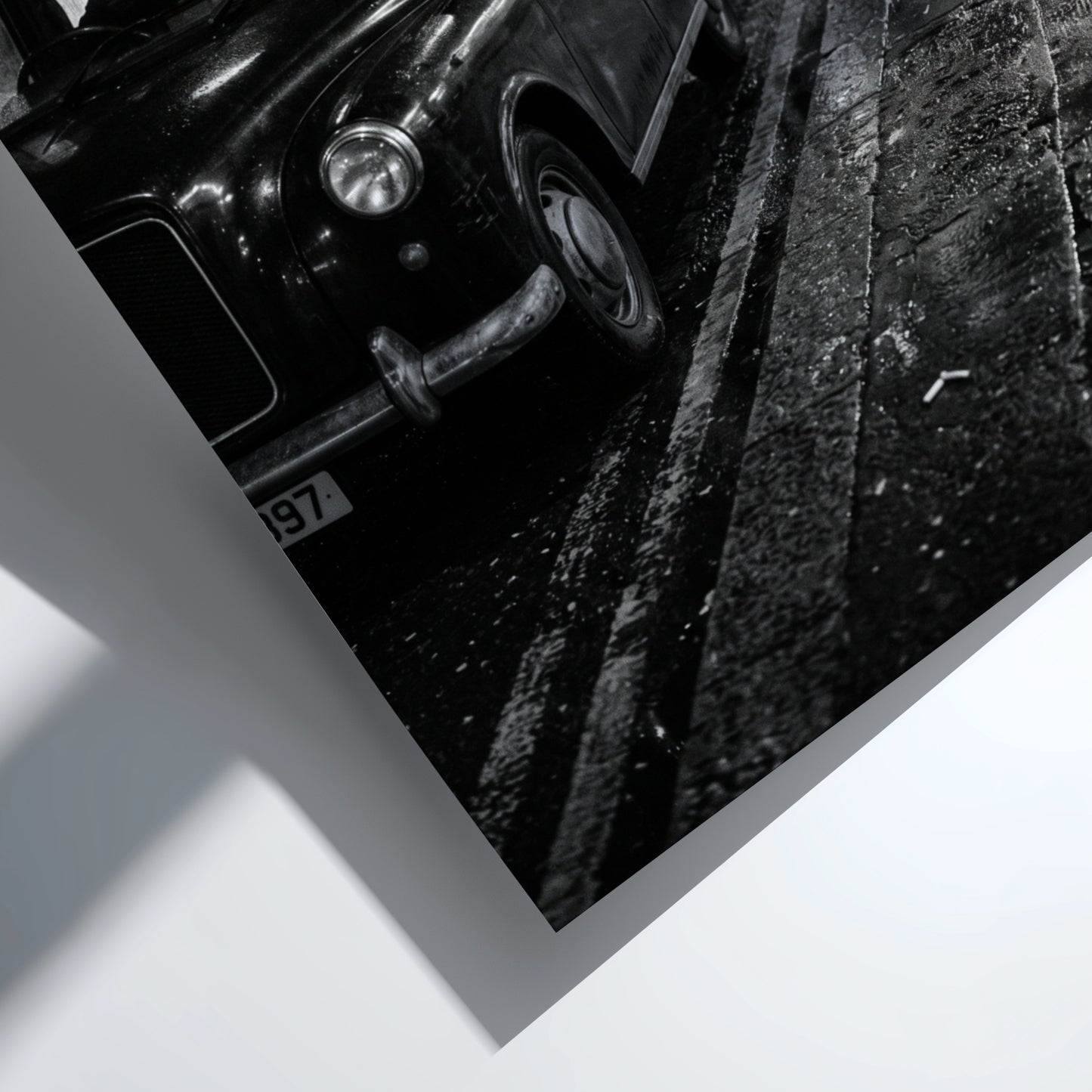 Wall decor showing black and white photo of London black cabs lined up at night on wet street