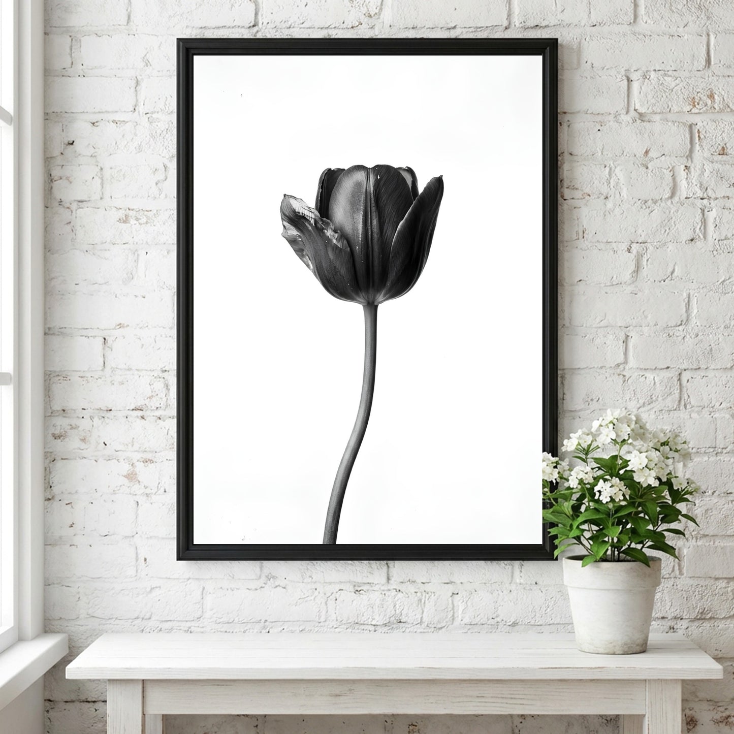 Black tulip flower wall decor with minimalist monochrome style on white background