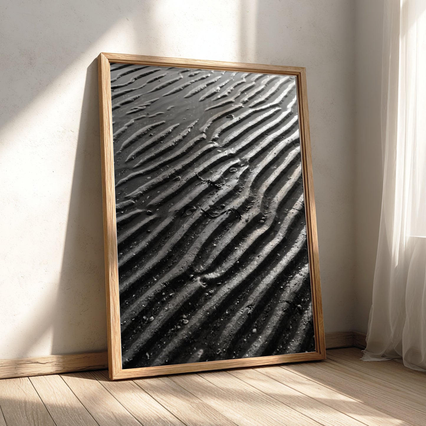 Poster of wet sand at low tide with black and gray rippled patterns and textured surface