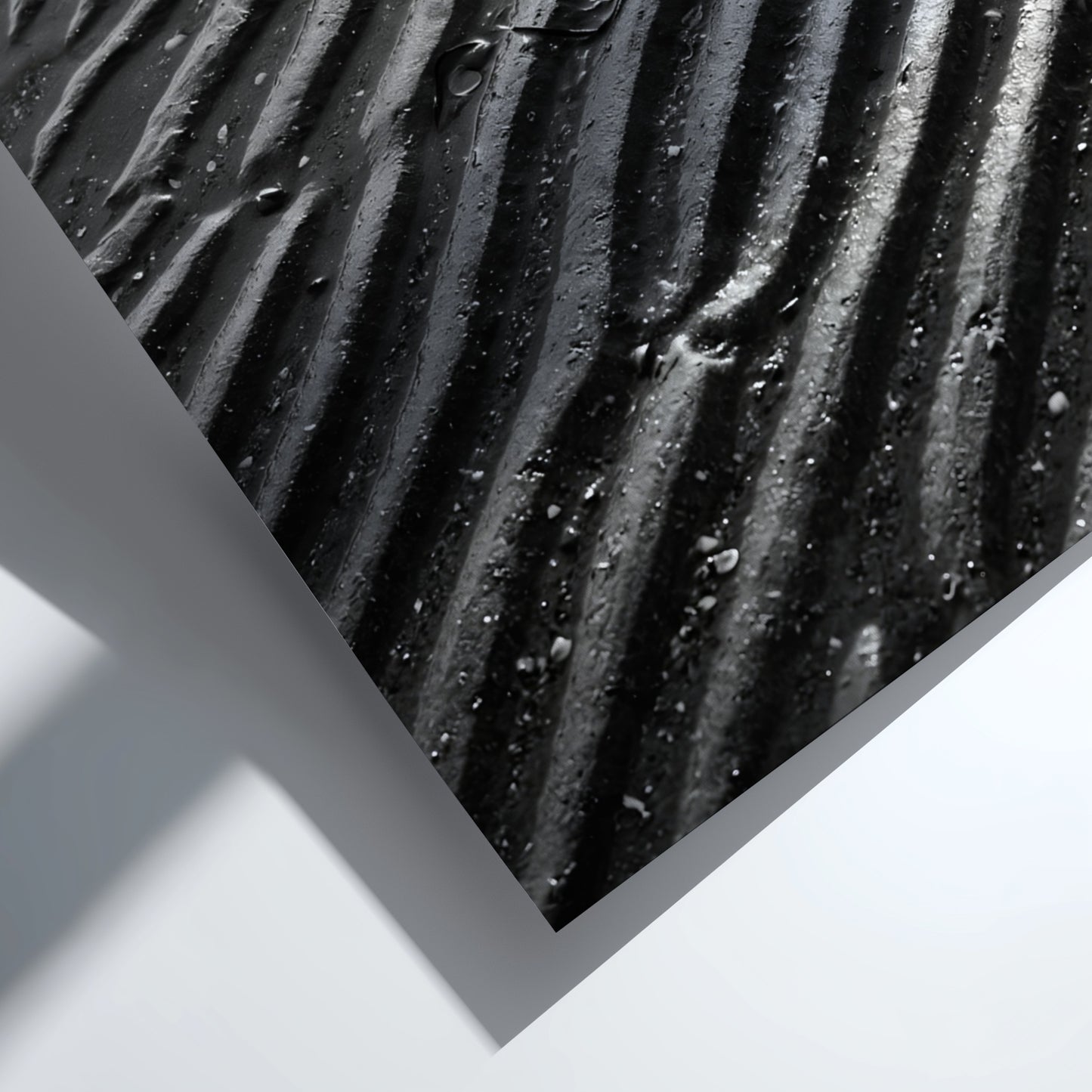 Poster of wet sand at low tide with black and gray rippled patterns and textured surface