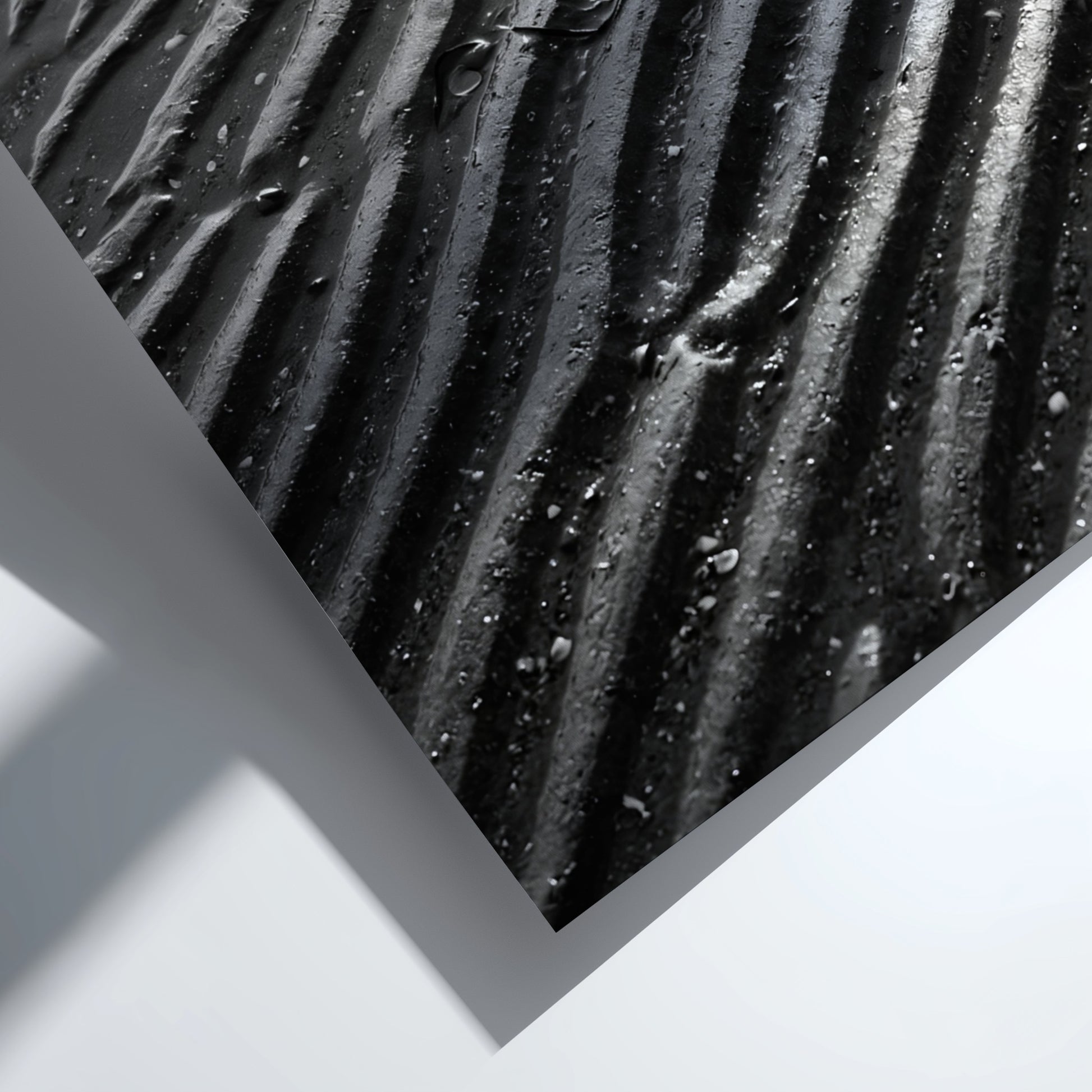 Poster of wet sand at low tide with black and gray rippled patterns and textured surface