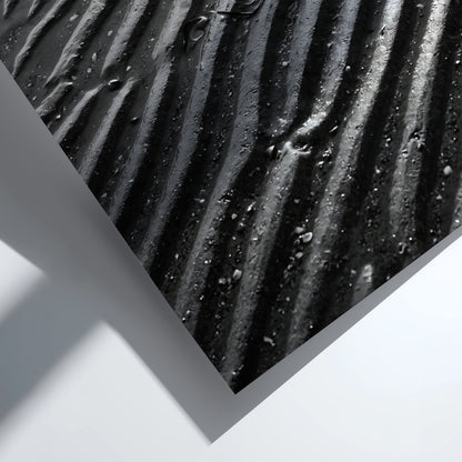 Poster of wet sand at low tide with black and gray rippled patterns and textured surface