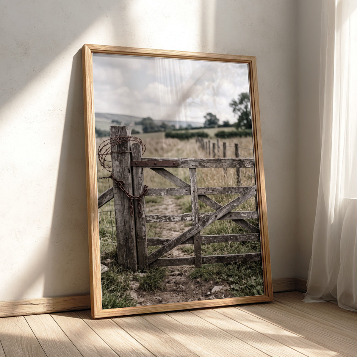 Wooden farm gate wall decor with rustic wood texture, barbed wire, and countryside background