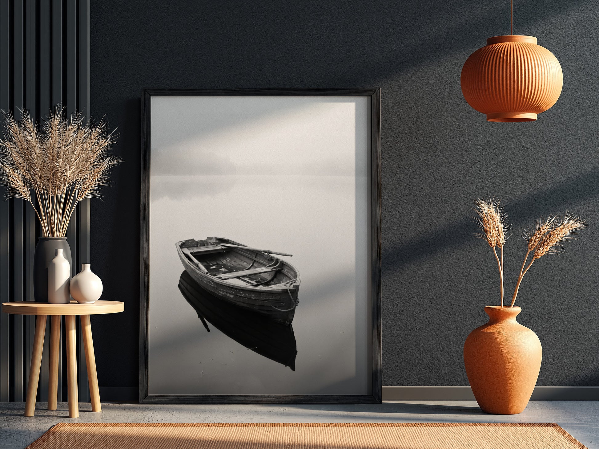 Black and white wall decor featuring a wooden rowing boat floating on calm water with soft reflections