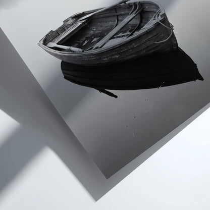 Black and white wall decor featuring a wooden rowing boat floating on calm water with soft reflections