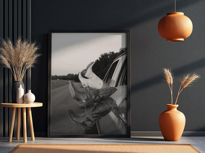 Cowboy Boots Out Car Window Poster | Black and White Photography Print | Western Lifestyle Wall Art | Vintage Road Trip Decor
