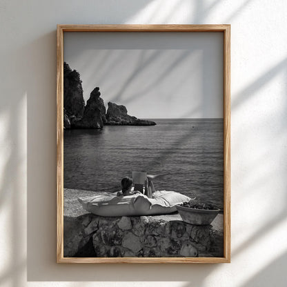 Reading By The Mediterranean Cove Poster | Black and White Photography Print | Vintage Coastal Wall Art | Retro Summer Decor