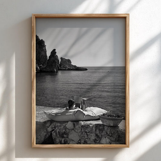 Reading By The Mediterranean Cove Poster | Black and White Photography Print | Vintage Coastal Wall Art | Retro Summer Decor