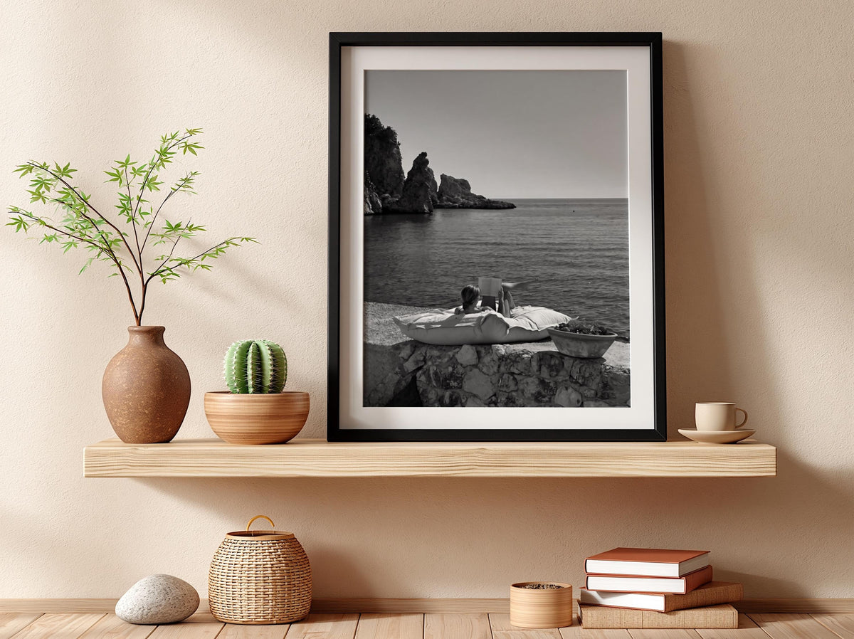 Reading By The Mediterranean Cove Poster | Black and White Photography Print | Vintage Coastal Wall Art | Retro Summer Decor